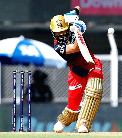 Mumbai : RCB's Virat Kohli plays a shot during the match between GT and RCB