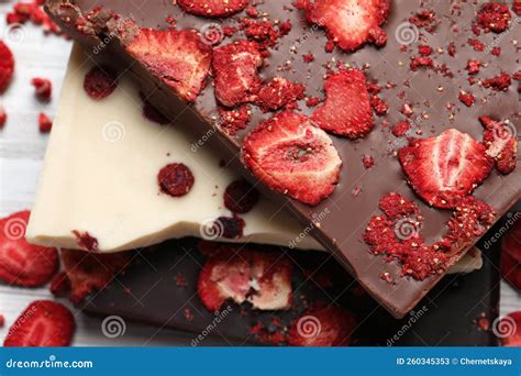 Different Chocolate Bars with Freeze Dried Fruits on Table, Closeup ...