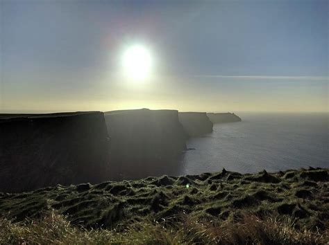 Sunset on the Cliffs of Moher Photograph by TJ Birnbaum - Pixels