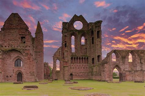 Ancient Ruins of Arbroath Abbey at Sunset in Scotland Photograph by Jim McDowall