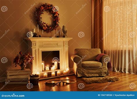 Cozy Fireplace with Armchair. Interior in a Cozy House Stock Photo ...