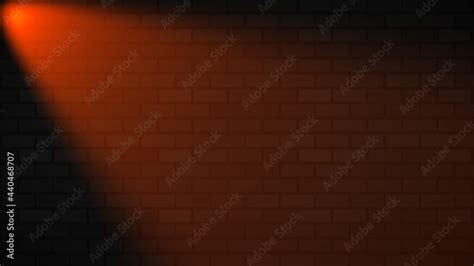 Empty brick wall with orange neon spotlight with copy space. Lighting ...