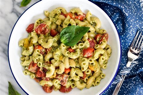 Pasta elbows with pesto and fresh tomatoes #makemary #vegan #glutenfree #plantbased #dairyfree # ...