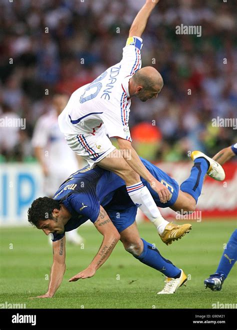 (L-R) Italy's Marco Materazzi and France's Zinedine Zidane battle for ...