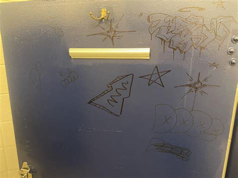 Actual graffiti-styled graffiti in public American high school bathroom : r/mildlyinteresting