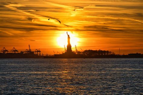 Statue Of Liberty At Sunset