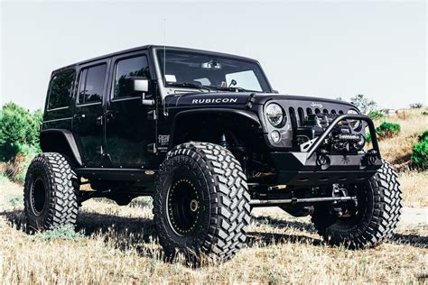 Perfect Fitment of Nitto Tires on Custom Black Lifted Jeep Wrangler — CARiD.com Gallery