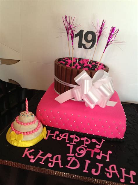 Pretty 19th birthday cake all put together. Looks delicious!!!! Www.FancyTreatsBoutique.com ...