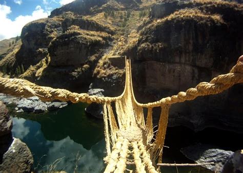 The last Incan suspension bridge is made entirely of grass and woven by ...