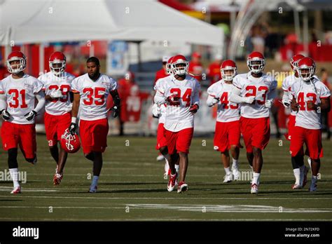 Kansas City Chiefs defensive players during NFL football training camp in St. Joseph, Mo ...