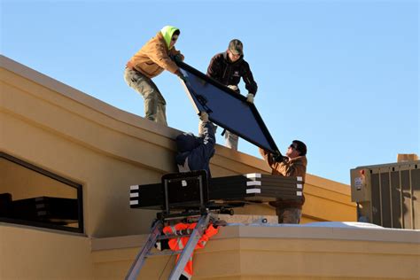 Lifting Solar Panel Module to the Roof of the Nature Center – Pajarito Environmental Education ...