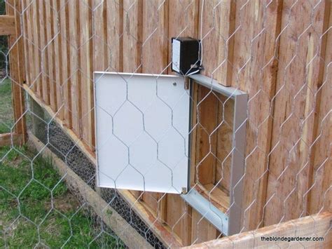 automatic chicken door--powered by solar panel and opens and closes from a light sensor ...