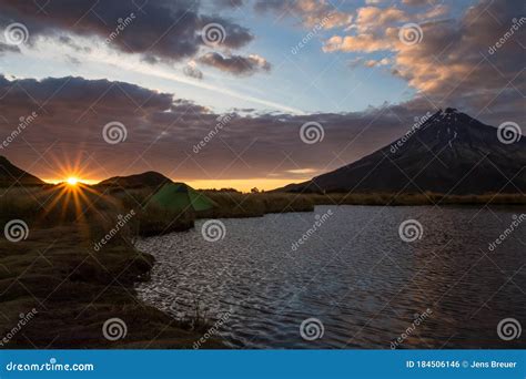 Sunrise Next To Volcano Mount Taranaki and Lake in the Forground Stock ...