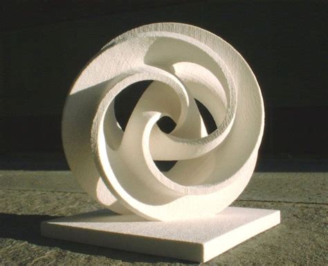 This sculpture is an example of radial symmetry and balance because all the pieces are centered ...