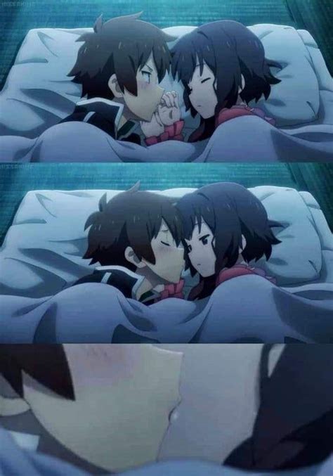 two anime characters laying in bed and one is kissing the other's foreheads