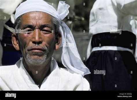 Portrait of a farmer during rice harvest festival Chindo Island South ...