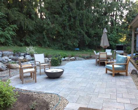 Water feature enhances a new patio landscape design | Patio Landscaping Maine