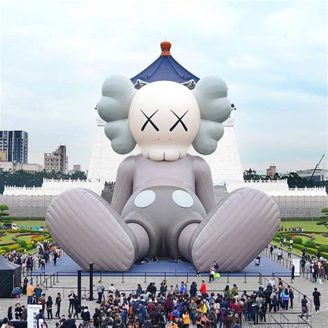 giant KAWS sculpture floating in hong kong harbor will float no longer