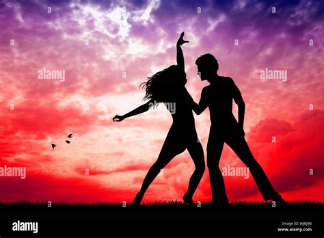 couple dancing at sunset Stock Photo - Alamy