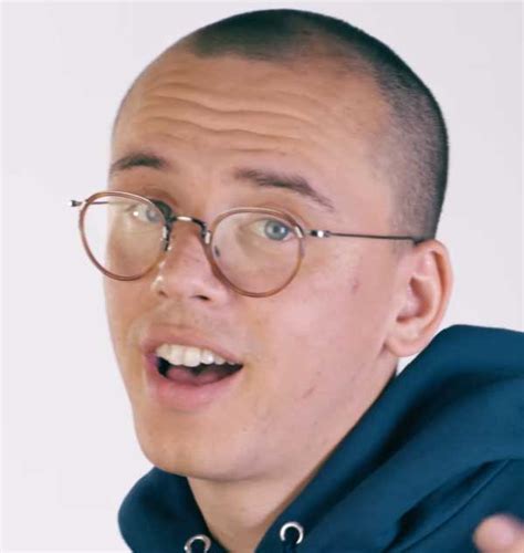 Logic reveals all his tattoos and tells the stories behind them ...