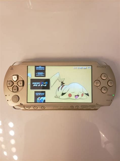 Modded Gold PSP 1000 w/ over 1000 games (PSP, PS1, Sega Genesis, N64 ...