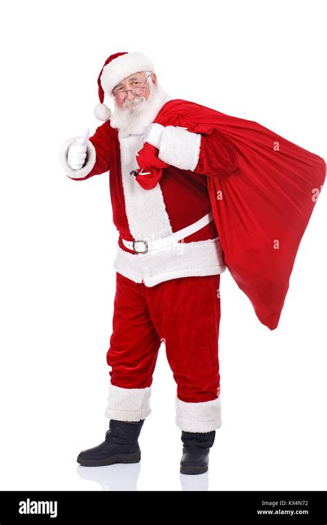 real Santa Claus carrying big bag and showing ok, isolated on white ...