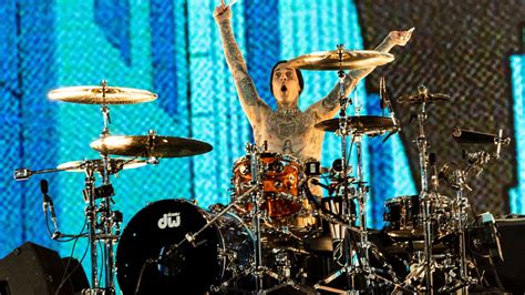 Blink 182 postpone UK gigs as Travis Barker rushes home for 'urgent ...