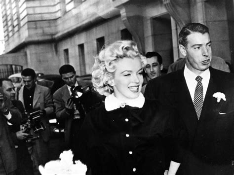 Marilyn Monroe and Joe DiMaggio after their wedding at the San Francisco town hall, 1954. | Old ...