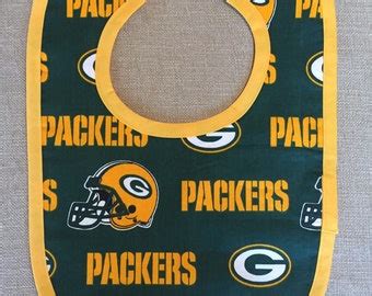 Items similar to Reversible Chicago Bears and Green Bay Packers Baby Bib for the baby with Both ...
