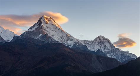 Annapurna South Summit and Some Clouds during Sunrise As Seen from Poonhill, Himalayas Stock ...