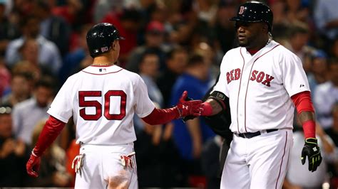 Red Sox OF Mookie Betts goes over the wall at Fenway Park to rob HR ...