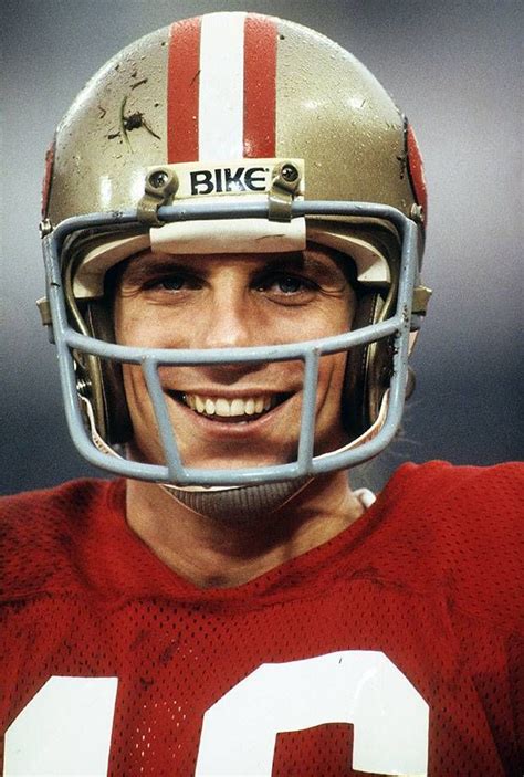 San Francisco 49ers quarterback Joe Montana smiles during a game against the Houston Oilers on ...