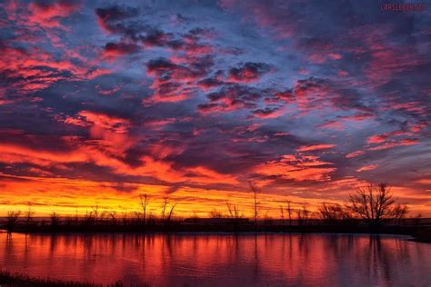 Frozen Pond Sunrise (12/13/2014). The sunrise was intense this morning. I drove by this pond ...