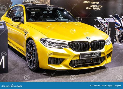 Yellow BMW M5 Competition Sedan at Geneva International Motor Show, F90 ...