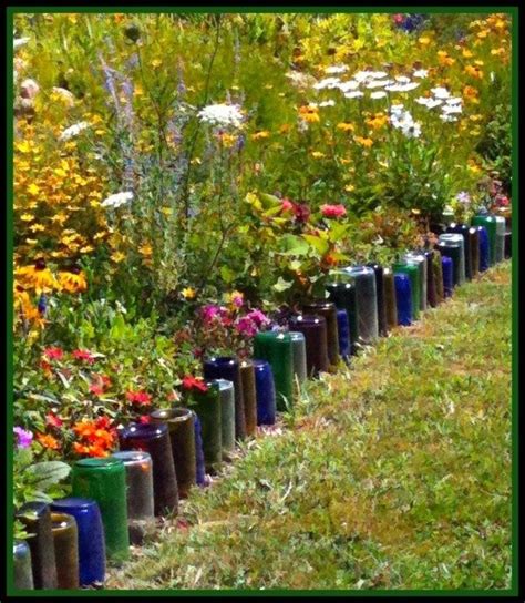 Glass Bottles border flower bed | Bottle garden, Garden edging, Wine ...