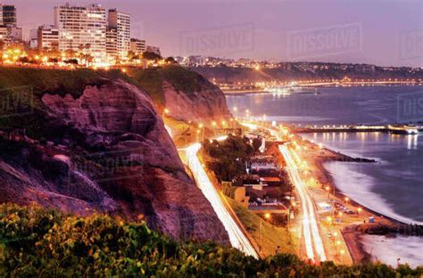 Peru, Lima, Miraflores, Cliffs of Miraflores at sunset - Stock Photo - Dissolve