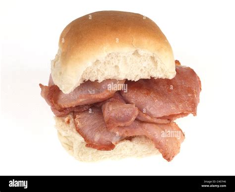 Fresh Tasty Traditional Bacon Breakfast Roll Isolated Against A White Stock Photo - Alamy