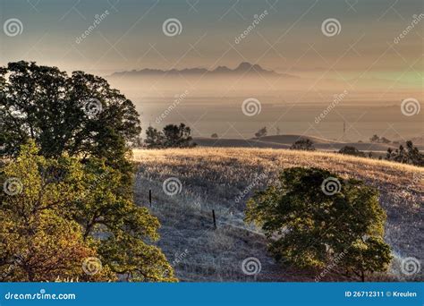 Sutter Buttes Sunrise stock image. Image of backlit, central - 26712311