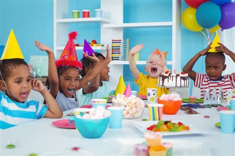 Excited Kids Enjoying a Birthday Party Stock Photo - Image of male, girl: 61438408