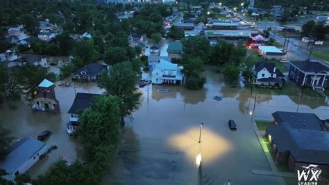 Kentucky flash flooding emergency as neighbourhoods turned into rivers and cars submerged ...