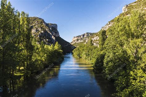 Ebro river through a valley in Spain — Stock Photo © J2R #127413356