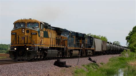 Showing It's True Colors | A patched CNW AC4400CW leads a we… | Flickr