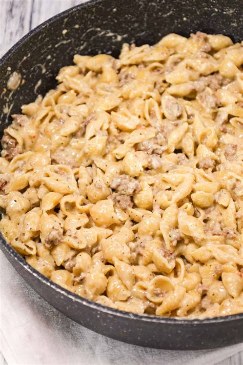 Ground Beef Alfredo is a creamy pasta recipe loaded with hamburger meat, garlic puree, Itali ...