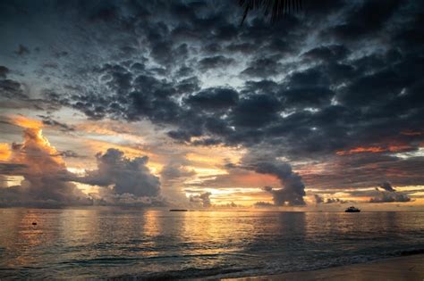 Premium Photo | Amazing sunset over the sea on a tropical island