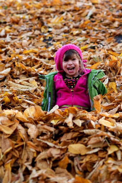 Jumping in the Leaves | Fall Leaves Kid Photo Inspiration | POPSUGAR ...