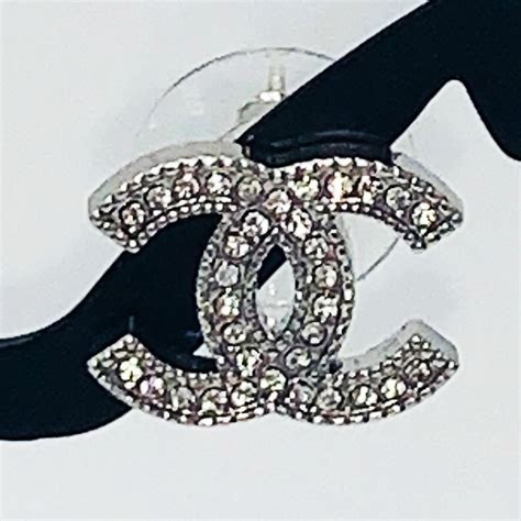 Vintage Pair of Authentic Chanel Earrings Silver set with Rhinestones - Artedeco - Online Antiques