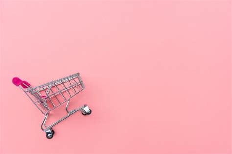 Empty shopping cart on pink background. ... | Premium Photo #Freepik #photo #background #sale # ...