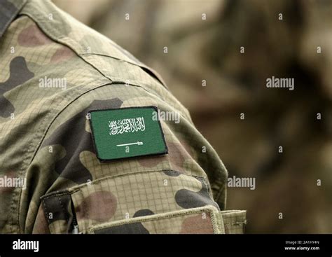 Flag of Saudi Arabia on military uniforms (collage Stock Photo - Alamy