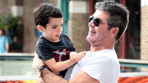 Simon Cowell's son Eric is all grown up in holiday snap! | HELLO!