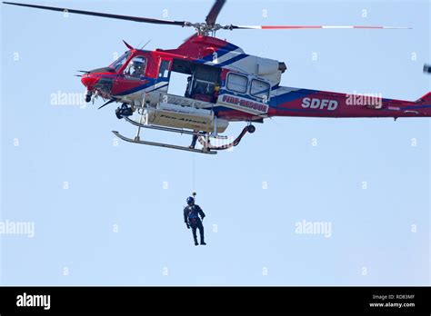 Fire Rescue Helicopter in Air Stock Photo - Alamy